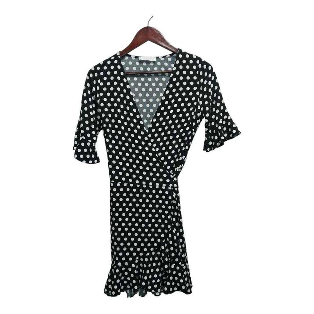 Adorable black polka dot dress by Elodie. Size small